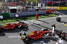 Carlos Sainz Jr (ESP) Ferrari F1-75 and Charles Leclerc (MON) Ferrari F1-75 in qualifying parc ferme. 10.09.2022. Formula 1 World Championship, Rd 16, Italian Grand Prix, Monza, Italy, Qualifying Day.