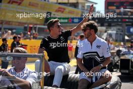 (L to R): George Russell (GBR) Mercedes AMG F1 and Pierre Gasly (FRA) AlphaTauri on the drivers parade. 11.09.2022. Formula 1 World Championship, Rd 16, Italian Grand Prix, Monza, Italy, Race Day.