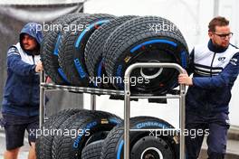 AlphaTauri mechanics with wet Pirelli tyres. 07.10.2022. Formula 1 World Championship, Rd 18, Japanese Grand Prix, Suzuka, Japan, Practice Day.