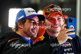 (L to R): Fernando Alonso (ESP) Alpine F1 Team with World Champion Max Verstappen (NLD) Red Bull Racing. 09.10.2022. Formula 1 World Championship, Rd 18, Japanese Grand Prix, Suzuka, Japan, Race Day.