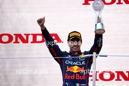 Sergio Perez (MEX) Red Bull Racing celebrates his second position on the podium. 09.10.2022. Formula 1 World Championship, Rd 18, Japanese Grand Prix, Suzuka, Japan, Race Day.