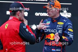 (L to R): Charles Leclerc (MON) Ferrari with race winner Max Verstappen (NLD) Red Bull Racing in parc ferme. 09.10.2022. Formula 1 World Championship, Rd 18, Japanese Grand Prix, Suzuka, Japan, Race Day.