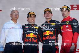 The podium (L to R): Charles Leclerc (MON) Ferrari, second; Sergio Perez (MEX) Red Bull Racing, race winner; Carlos Sainz Jr (ESP) Ferrari, third. 09.10.2022. Formula 1 World Championship, Rd 18, Japanese Grand Prix, Suzuka, Japan, Race Day.