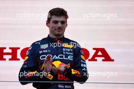 Race winner Max Verstappen (NLD) Red Bull Racing celebrates on the podium. 09.10.2022. Formula 1 World Championship, Rd 18, Japanese Grand Prix, Suzuka, Japan, Race Day.
