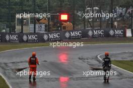 Circuit atmosphere - race stopped - marshals on circuit. 09.10.2022. Formula 1 World Championship, Rd 18, Japanese Grand Prix, Suzuka, Japan, Race Day.
