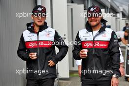 (L to R): Guanyu Zhou (CHN) Alfa Romeo F1 Team with team mate Valtteri Bottas (FIN) Alfa Romeo F1 Team. 08.10.2022. Formula 1 World Championship, Rd 18, Japanese Grand Prix, Suzuka, Japan, Qualifying Day.