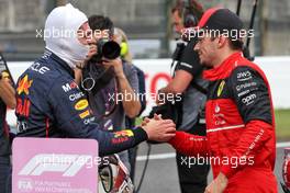 (L to R): Max Verstappen (NLD) Red Bull Racing celebrates his pole position in qualifying parc ferme with second placed Charles Leclerc (MON) Ferrari. 08.10.2022. Formula 1 World Championship, Rd 18, Japanese Grand Prix, Suzuka, Japan, Qualifying Day.