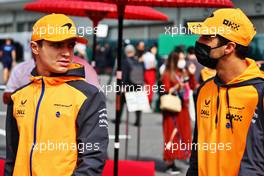 (L to R): Lando Norris (GBR) McLaren with team mate Daniel Ricciardo (AUS) McLaren. 08.10.2022. Formula 1 World Championship, Rd 18, Japanese Grand Prix, Suzuka, Japan, Qualifying Day.