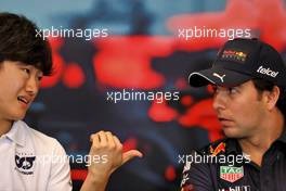 (L to R): Yuki Tsunoda (JPN) AlphaTauri and Sergio Perez (MEX) Red Bull Racing in the FIA Press Conference. 27.05.2022. Formula 1 World Championship, Rd 7, Monaco Grand Prix, Monte Carlo, Monaco, Friday.