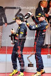 (L to R): race winner Sergio Perez (MEX) Red Bull Racing celebrates on the podium with third placed team mate Max Verstappen (NLD) Red Bull Racing. 29.05.2022. Formula 1 World Championship, Rd 7, Monaco Grand Prix, Monte Carlo, Monaco, Race Day.