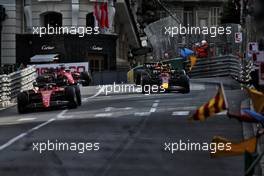 Carlos Sainz Jr (ESP) Ferrari F1-75 and race winner Sergio Perez (MEX) Red Bull Racing RB18 at the end of the race. 29.05.2022. Formula 1 World Championship, Rd 7, Monaco Grand Prix, Monte Carlo, Monaco, Race Day.