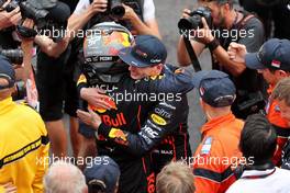 Race winner Sergio Perez (MEX) Red Bull Racing celebrates with team mate Max Verstappen (NLD) Red Bull Racing in parc ferme. 29.05.2022. Formula 1 World Championship, Rd 7, Monaco Grand Prix, Monte Carlo, Monaco, Race Day.