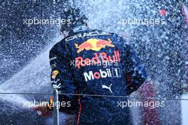 Race winner Sergio Perez (MEX) Red Bull Racing celebrates on the podium. 29.05.2022. Formula 1 World Championship, Rd 7, Monaco Grand Prix, Monte Carlo, Monaco, Race Day.