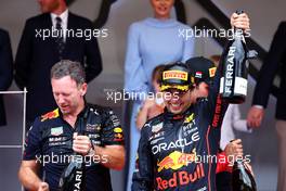 Race winner Sergio Perez (MEX) Red Bull Racing celebrates on the podium with Christian Horner (GBR) Red Bull Racing Team Principal. 29.05.2022. Formula 1 World Championship, Rd 7, Monaco Grand Prix, Monte Carlo, Monaco, Race Day.
