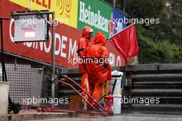 Marshals with red flags as rain stops play. 29.05.2022. Formula 1 World Championship, Rd 7, Monaco Grand Prix, Monte Carlo, Monaco, Race Day.