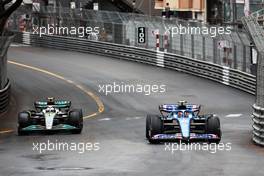 Lewis Hamilton (GBR) Mercedes AMG F1 W13 and Esteban Ocon (FRA) Alpine F1 Team A522 battle for position. 29.05.2022. Formula 1 World Championship, Rd 7, Monaco Grand Prix, Monte Carlo, Monaco, Race Day.