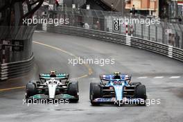 Lewis Hamilton (GBR) Mercedes AMG F1 W13 and Esteban Ocon (FRA) Alpine F1 Team A522 battle for position. 29.05.2022. Formula 1 World Championship, Rd 7, Monaco Grand Prix, Monte Carlo, Monaco, Race Day.