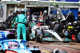George Russell (GBR) Mercedes AMG F1 W13 makes a pit stop. 29.05.2022. Formula 1 World Championship, Rd 7, Monaco Grand Prix, Monte Carlo, Monaco, Race Day.