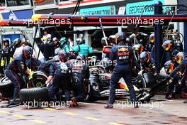 Sergio Perez (MEX) Red Bull Racing RB18 makes a pit stop. 29.05.2022. Formula 1 World Championship, Rd 7, Monaco Grand Prix, Monte Carlo, Monaco, Race Day.