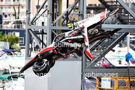 The damaged Haas VF-22 of Mick Schumacher (GER) Haas F1 Team is craned clear. 29.05.2022. Formula 1 World Championship, Rd 7, Monaco Grand Prix, Monte Carlo, Monaco, Race Day.