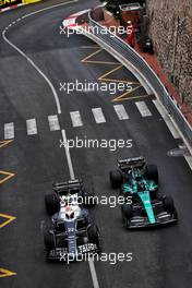 Yuki Tsunoda (JPN) AlphaTauri AT03 and Lance Stroll (CDN) Aston Martin F1 Team AMR22 battle for position. 29.05.2022. Formula 1 World Championship, Rd 7, Monaco Grand Prix, Monte Carlo, Monaco, Race Day.