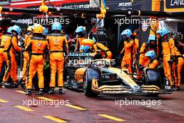 Lando Norris (GBR) McLaren MCL36 makes a pit stop. 29.05.2022. Formula 1 World Championship, Rd 7, Monaco Grand Prix, Monte Carlo, Monaco, Race Day.