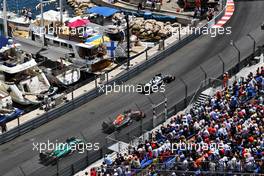Pierre Gasly (FRA) AlphaTauri AT03 leads Sergio Perez (MEX) Red Bull Racing RB18 and Sebastian Vettel (GER) Aston Martin F1 Team AMR22. 28.05.2022. Formula 1 World Championship, Rd 7, Monaco Grand Prix, Monte Carlo, Monaco, Qualifying Day.