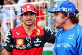 Fernando Alonso (ESP) Alpine F1 Team and Carlos Sainz Jr (ESP) Ferrari on the drivers parade. 29.05.2022. Formula 1 World Championship, Rd 7, Monaco Grand Prix, Monte Carlo, Monaco, Race Day.