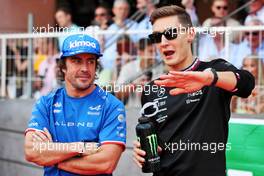 (L to R): Fernando Alonso (ESP) Alpine F1 Team and George Russell (GBR) Mercedes AMG F1 on the drivers parade. 29.05.2022. Formula 1 World Championship, Rd 7, Monaco Grand Prix, Monte Carlo, Monaco, Race Day.
