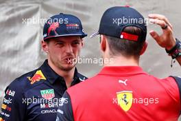 (L to R): Max Verstappen (NLD) Red Bull Racing with Charles Leclerc (MON) Ferrari on the drivers parade. 29.05.2022. Formula 1 World Championship, Rd 7, Monaco Grand Prix, Monte Carlo, Monaco, Race Day.