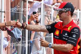 Charles Leclerc (MON) Ferrari with fans on the drivers parade. 29.05.2022. Formula 1 World Championship, Rd 7, Monaco Grand Prix, Monte Carlo, Monaco, Race Day.