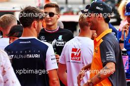 (L to R): Pierre Gasly (FRA) AlphaTauri with Daniel Ricciardo (AUS) McLaren on the drivers parade. 29.05.2022. Formula 1 World Championship, Rd 7, Monaco Grand Prix, Monte Carlo, Monaco, Race Day.