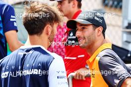(L to R): Pierre Gasly (FRA) AlphaTauri with Daniel Ricciardo (AUS) McLaren on the drivers parade. 29.05.2022. Formula 1 World Championship, Rd 7, Monaco Grand Prix, Monte Carlo, Monaco, Race Day.