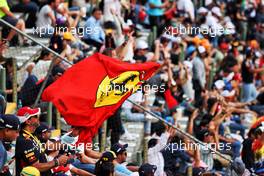 Circuit atmosphere - Ferrari flag flown by fan in the grandstand. 28.10.2022. Formula 1 World Championship, Rd 20, Mexican Grand Prix, Mexico City, Mexico, Practice Day.