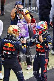 (L to R): Race winner Max Verstappen (NLD) Red Bull Racing celebrates with third placed team mate Sergio Perez (MEX) Red Bull Racing in parc ferme. 30.10.2022. Formula 1 World Championship, Rd 20, Mexican Grand Prix, Mexico City, Mexico, Race Day.