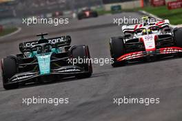 (L to R): Lance Stroll (CDN) Aston Martin F1 Team AMR22 and Mick Schumacher (GER) Haas VF-22 battle for position. 30.10.2022. Formula 1 World Championship, Rd 20, Mexican Grand Prix, Mexico City, Mexico, Race Day.