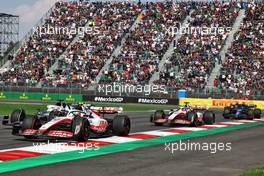 Mick Schumacher (GER) Haas VF-22 and Pierre Gasly (FRA) AlphaTauri AT03 at the start of the race. 30.10.2022. Formula 1 World Championship, Rd 20, Mexican Grand Prix, Mexico City, Mexico, Race Day.