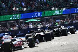 Pierre Gasly (FRA) AlphaTauri AT03 leads Mick Schumacher (GER) Haas VF-22 and Kevin Magnussen (DEN) Haas VF-22. 30.10.2022. Formula 1 World Championship, Rd 20, Mexican Grand Prix, Mexico City, Mexico, Race Day.