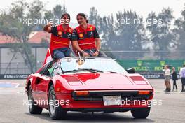 (L to R): Carlos Sainz Jr (ESP) Ferrari and Charles Leclerc (MON) Ferrari on the drivers parade. 30.10.2022. Formula 1 World Championship, Rd 20, Mexican Grand Prix, Mexico City, Mexico, Race Day.