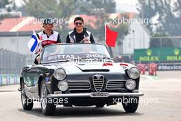 (L to R): Valtteri Bottas (FIN) Alfa Romeo F1 Team and Guanyu Zhou (CHN) Alfa Romeo F1 Team on the drivers parade. 30.10.2022. Formula 1 World Championship, Rd 20, Mexican Grand Prix, Mexico City, Mexico, Race Day.