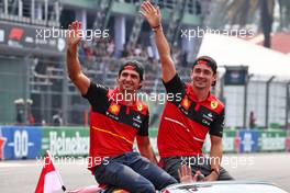 (L to R): Carlos Sainz Jr (ESP) Ferrari and Charles Leclerc (MON) Ferrari on the drivers parade. 30.10.2022. Formula 1 World Championship, Rd 20, Mexican Grand Prix, Mexico City, Mexico, Race Day.