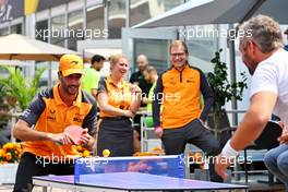 Daniel Ricciardo (AUS) McLaren plays table tennis in the paddock with Timo Glock (GER). 27.10.2022. Formula 1 World Championship, Rd 20, Mexican Grand Prix, Mexico City, Mexico, Preparation Day.