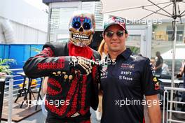 Sergio Perez (MEX) Red Bull Racing with a Day of the Dead Skeleton. 27.10.2022. Formula 1 World Championship, Rd 20, Mexican Grand Prix, Mexico City, Mexico, Preparation Day.