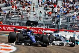 Nicholas Latifi (CDN) Williams Racing FW44 and Pierre Gasly (FRA) AlphaTauri AT03. 06.05.2022. Formula 1 World Championship, Rd 5, Miami Grand Prix, Miami, Florida, USA, Practice Day.