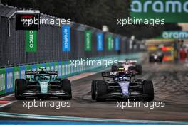 (L to R): Sebastian Vettel (GER) Aston Martin F1 Team AMR22 and Nicholas Latifi (CDN) Williams Racing FW44 battle for position. 08.05.2022. Formula 1 World Championship, Rd 5, Miami Grand Prix, Miami, Florida, USA, Race Day.