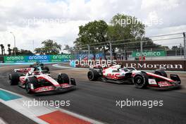 (L to R): Kevin Magnussen (DEN) Haas VF-22 and Mick Schumacher (GER) Haas VF-22 battle for position. 08.05.2022. Formula 1 World Championship, Rd 5, Miami Grand Prix, Miami, Florida, USA, Race Day.