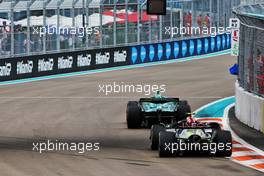Sebastian Vettel (GER) Aston Martin F1 Team AMR22 leads Lewis Hamilton (GBR) Mercedes AMG F1 W13. 07.05.2022. Formula 1 World Championship, Rd 5, Miami Grand Prix, Miami, Florida, USA, Qualifying Day.
