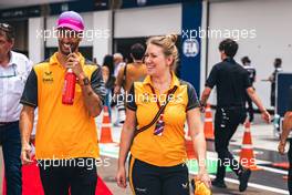 Daniel Ricciardo (AUS) McLaren with Sophie Ogg (GBR) McLaren Communications Director on the drivers parade. 08.05.2022. Formula 1 World Championship, Rd 5, Miami Grand Prix, Miami, Florida, USA, Race Day.