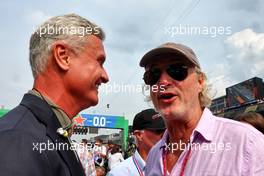 (L to R): David Coulthard (GBR) Red Bull Racing and Scuderia Toro Advisor / Channel 4 F1 Commentator with Eddie Irvine (GBR) on the grid. 04.09.2022. Formula 1 World Championship, Rd 14, Dutch Grand Prix, Zandvoort, Netherlands, Race Day.