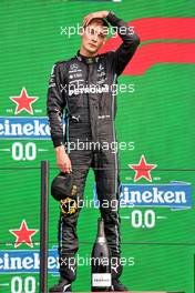 George Russell (GBR) Mercedes AMG F1 celebrates his second position on the podium.. 04.09.2022. Formula 1 World Championship, Rd 14, Dutch Grand Prix, Zandvoort, Netherlands, Race Day.